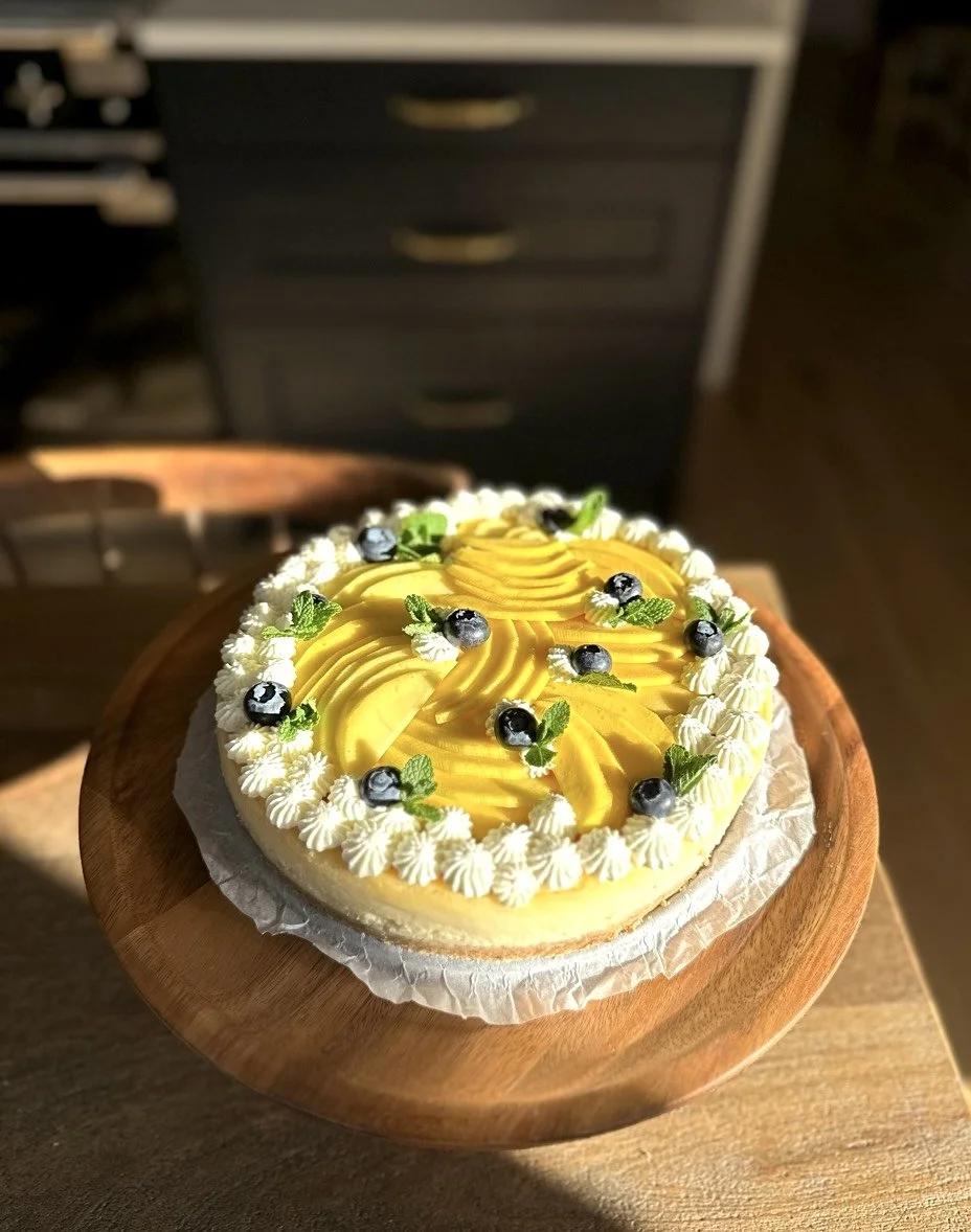 Artisanal mango and fresh blueberry baked cheesecake made in Cambridge by The Cake Lady
